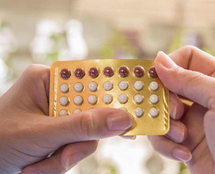 Woman hand holding a contraceptive panel prevent pregnancy