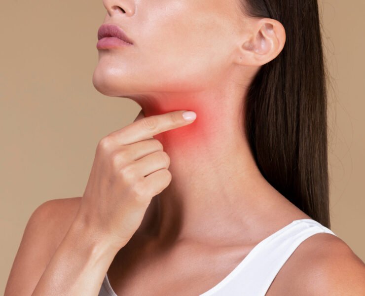 Healthcare concept. Closeup of unrecognizable sick lady suffering from sore throat, touching neck with hand, inflamed red zone, banner, cropped